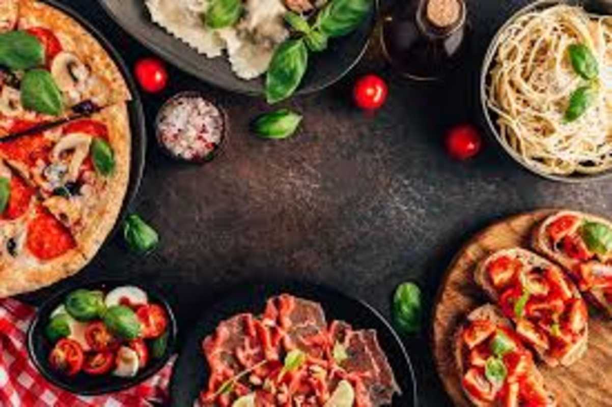 Assorted Italian dishes pizza pasta caprese at restaurant investment Panama