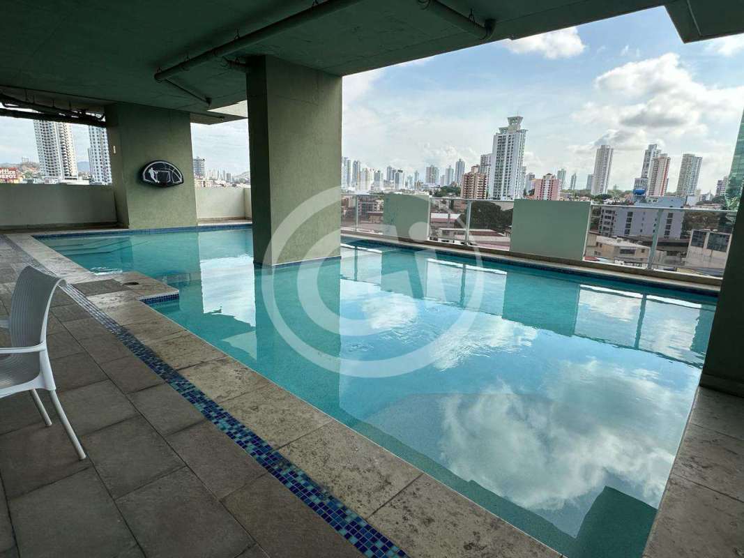 Modern kitchen with granite countertops and large window PH Miyaki penthouse Panama City