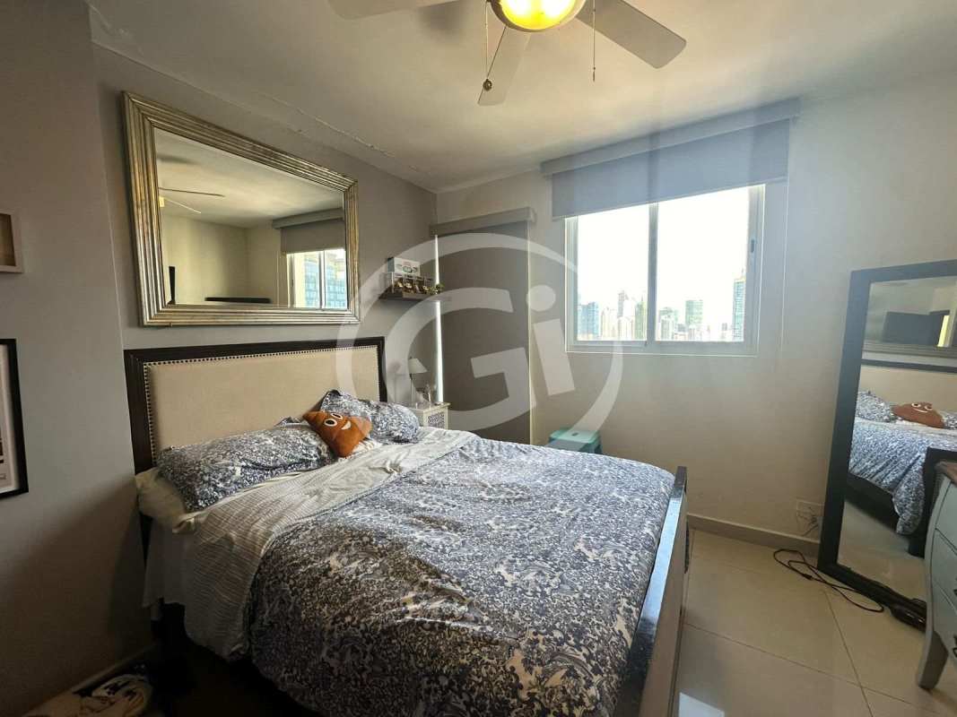 Penthouse bedroom suite with hardwood tiles, skyline views at PH Miyaki Obarrio Panama