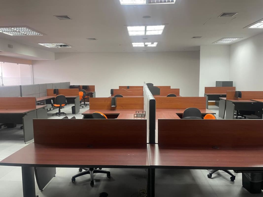 Large open plan call center workspace with cubicles and chairs Calle 50 Panama City