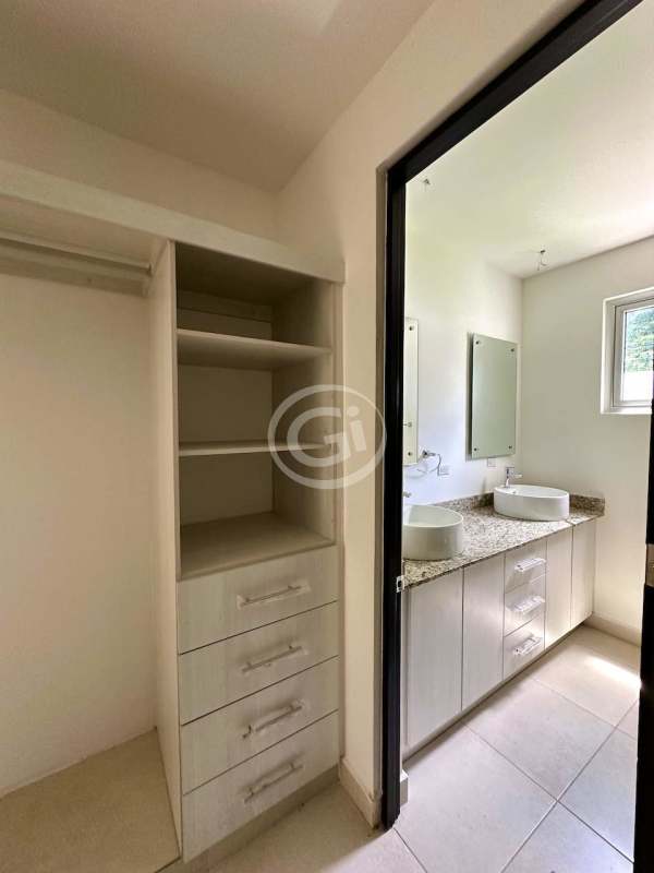 Master bedroom with balcony garden view en-suite bath Villa Sur Costa Sur Panama