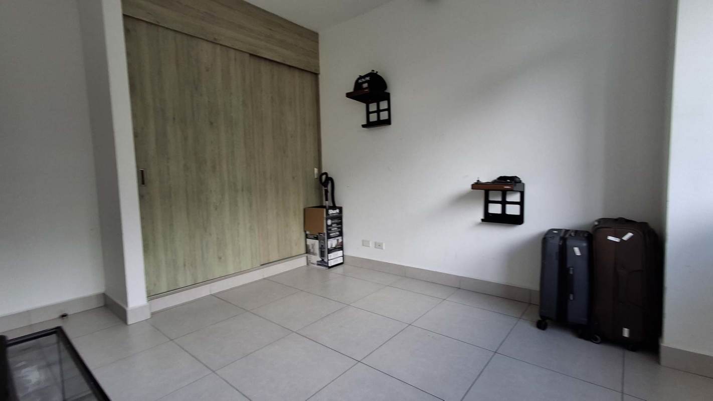 Minimalist bedroom design with built-in closet and clean lines apartment Altos de Panama