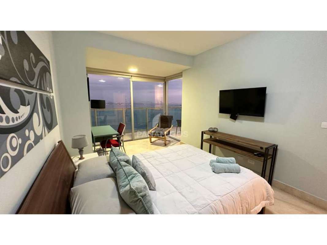 Luxury bathroom with vessel sink, glass shower and stylish details in Yoo Panama condo