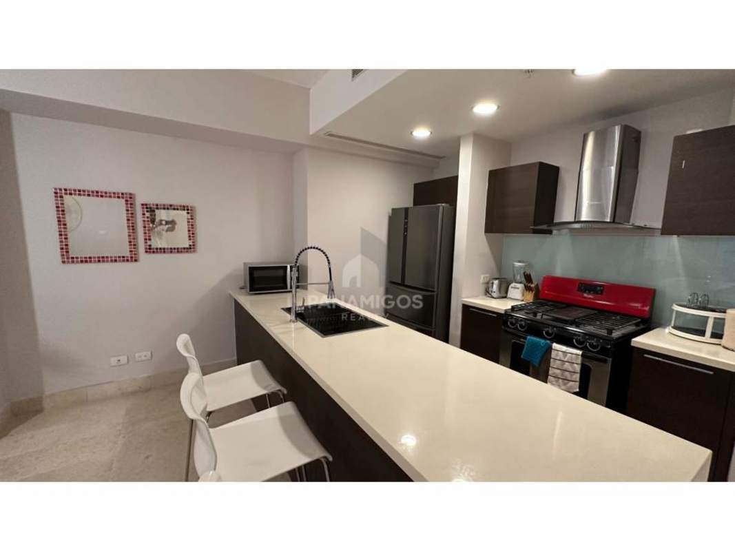 Modern bedroom with full-height windows and ocean views in Yoo Panama Avenida Balboa