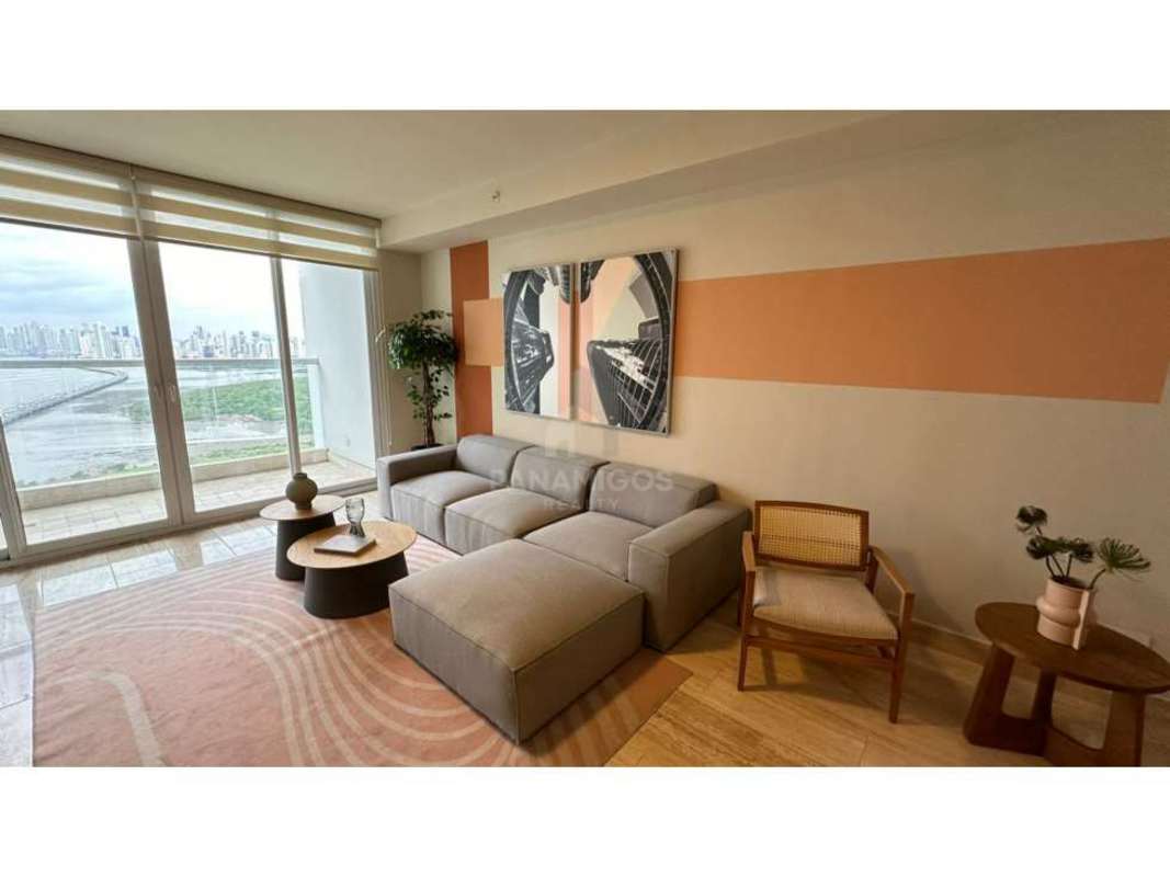 Bedroom with large windows offering ocean and skyline views in PH Regent Costa del Este Panama