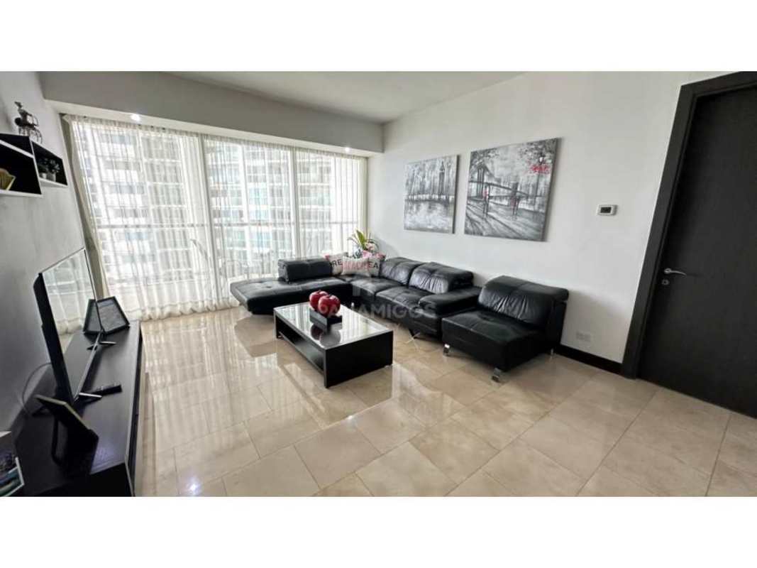 Spacious living room with floor-to-ceiling windows and balcony access in Ocean Club luxury condo Punta Pacifica