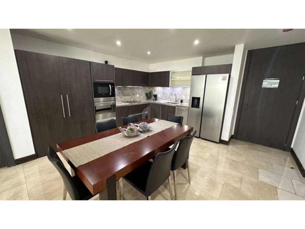 Elegant marble bathroom with glass-enclosed shower at luxury condo The Ocean Club Punta Pacifica