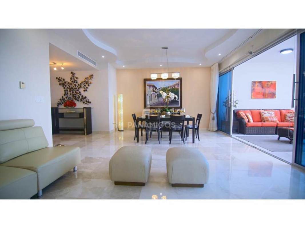 Luxurious living area with sectional sofa and modern decor in PH Pacific Village Punta Pacífica Panama