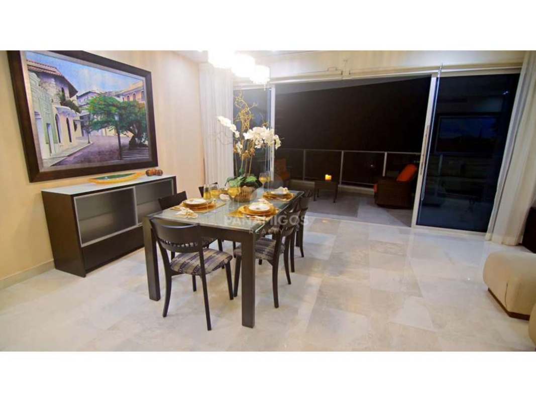 Spacious living room with floor-to-ceiling windows balcony and skyline views in PH Pacific Village Punta Pacífica Panama