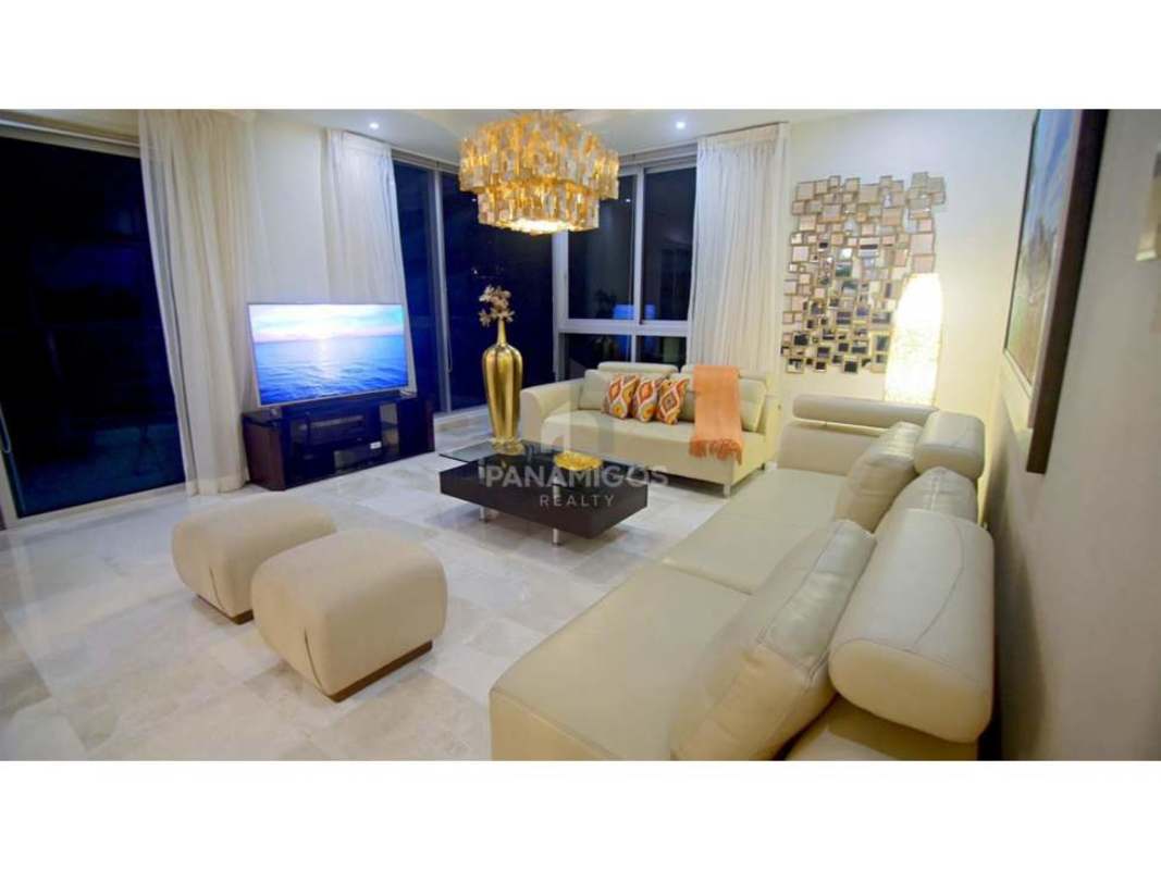 Spacious contemporary living room with sectional sofa, marble floors, city skyline views in PH Pacific Village Punta Pacífica Panama