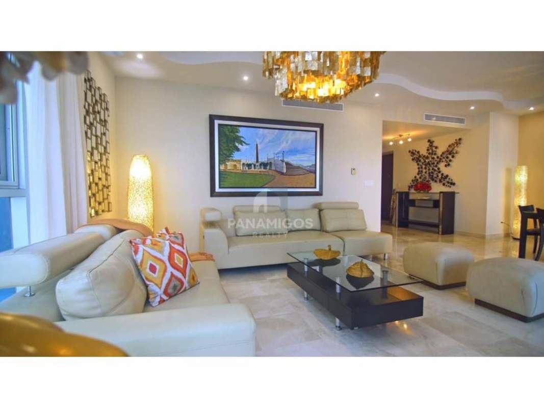 Modern open plan living and dining room area with marble floors and access to balcony in PH Pacific Village Punta Pacífica Panama