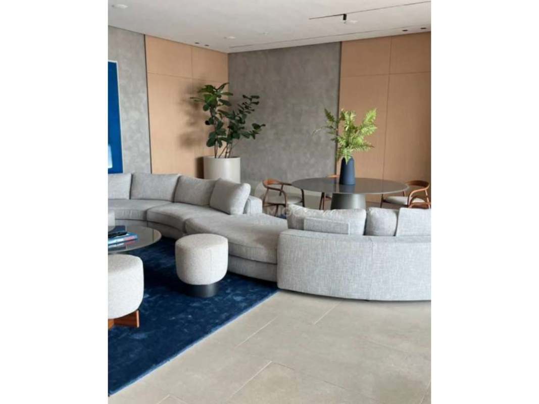 Spacious bedroom with large windows overlooking golf course in Ocean House Santa María Panama