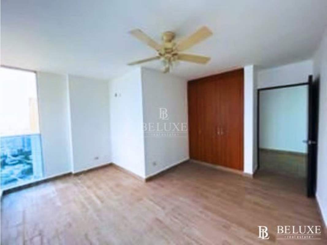 Modern bathroom with granite countertop and glass shower Punta Pacífica Panama
