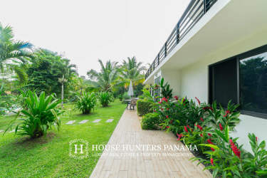 Outdoor swimming pool with terrace and mountain views Panama countryside house