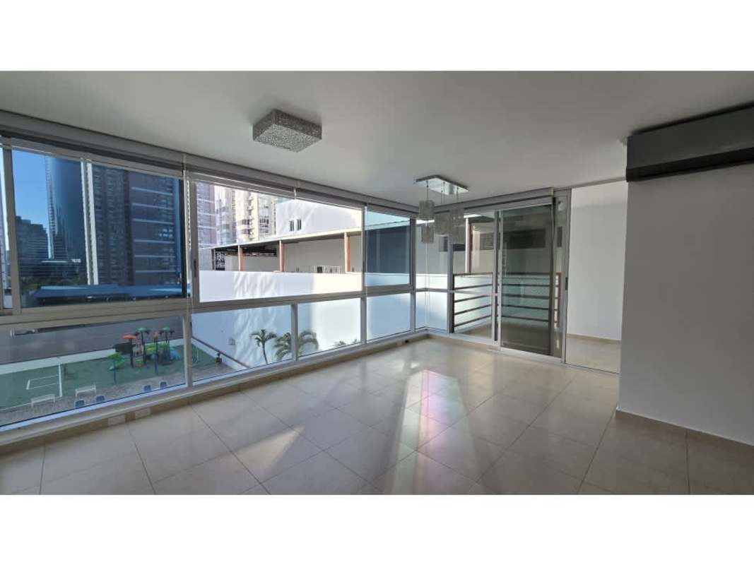 Modern living room with large windows and natural light in PH Sol del Este Costa del Este Panama