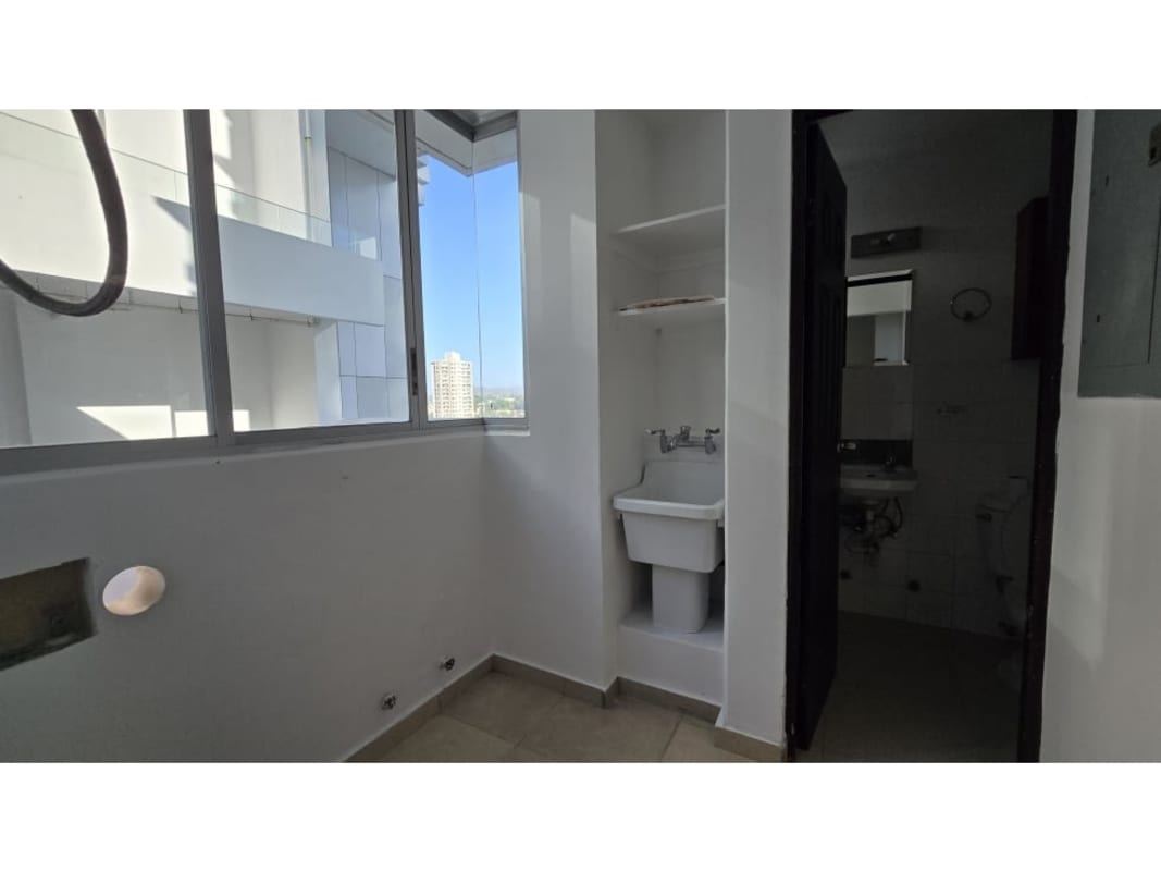 Laundry room with utility sink and storage shelves in PH Sol del Este Costa del Este Panama