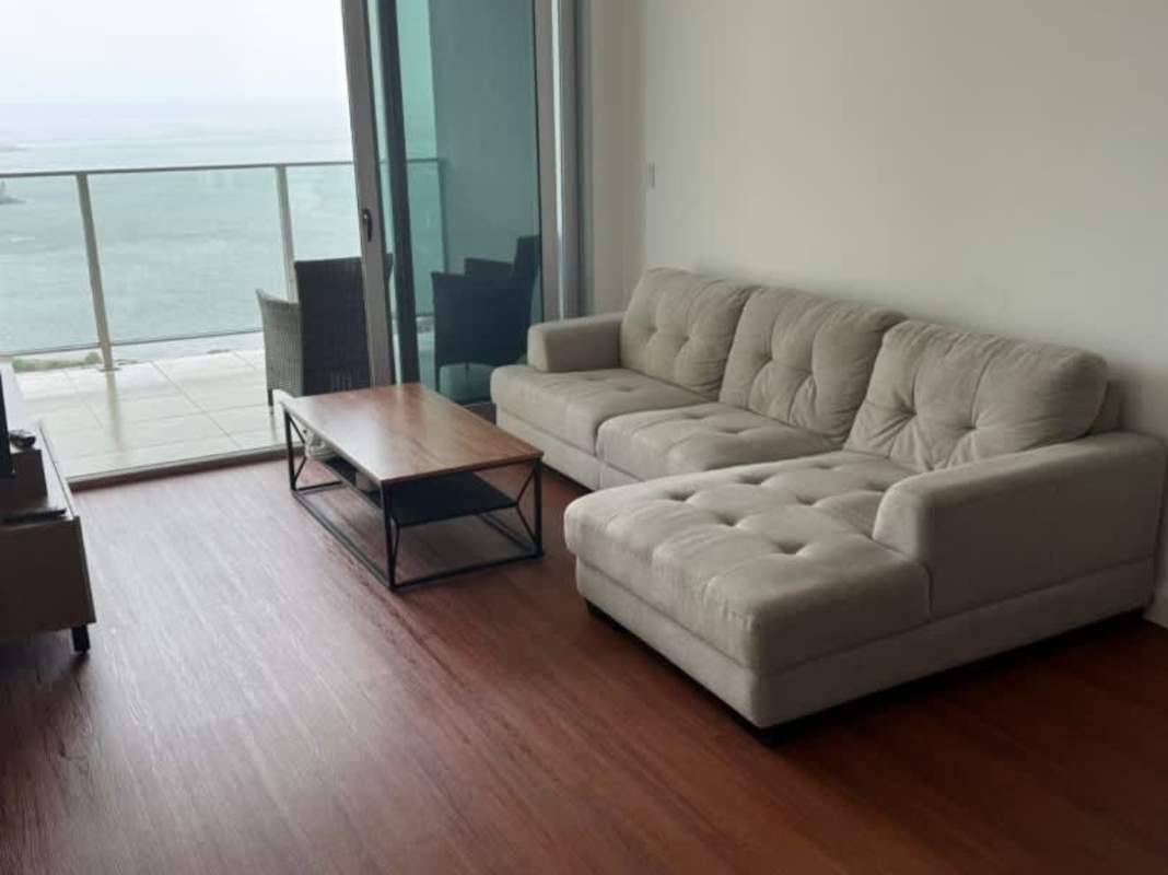 Spacious living dining room with balcony floor to ceiling windows ocean view PH BICSA Avenida Balboa Panama