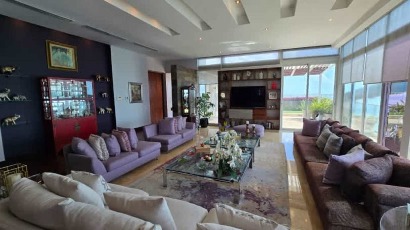 Open living dining concept with skyline and ocean views penthouse Pacific Point Panama City