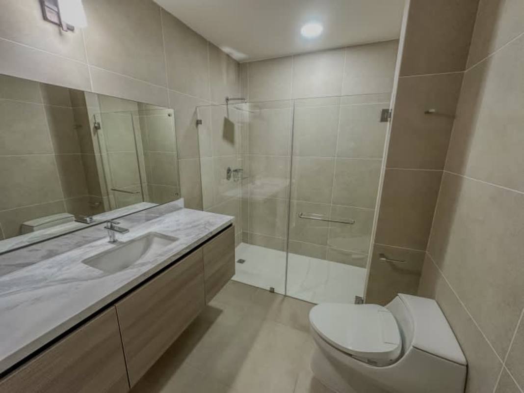 Bathroom with glass shower, floating vanity, modern finishes PH Ocean House Santa María