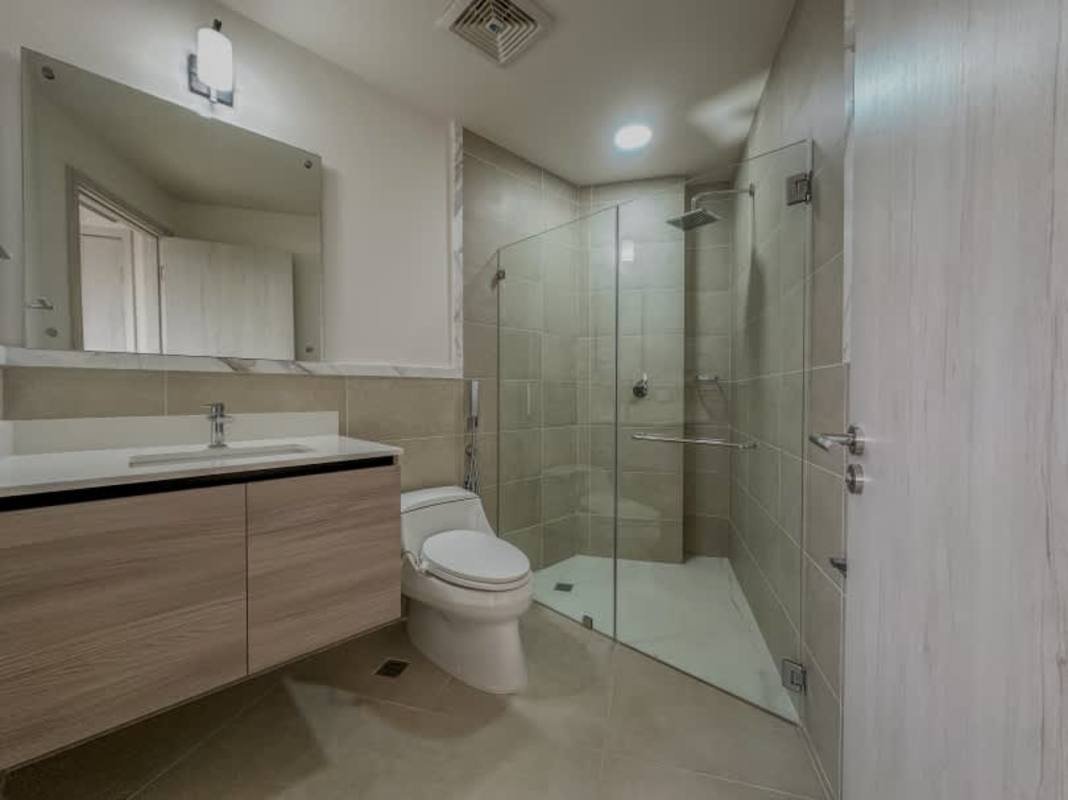 Half bathroom with floating sink, mirror, modern design PH Ocean House Panama