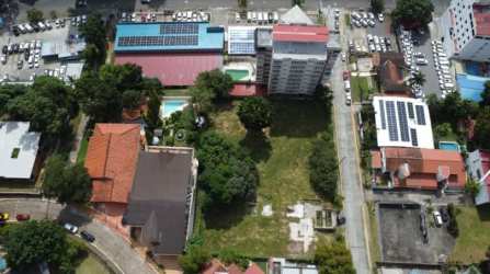 Urban vacant land surrounded by mixed-use buildings in La Cresta ready for project