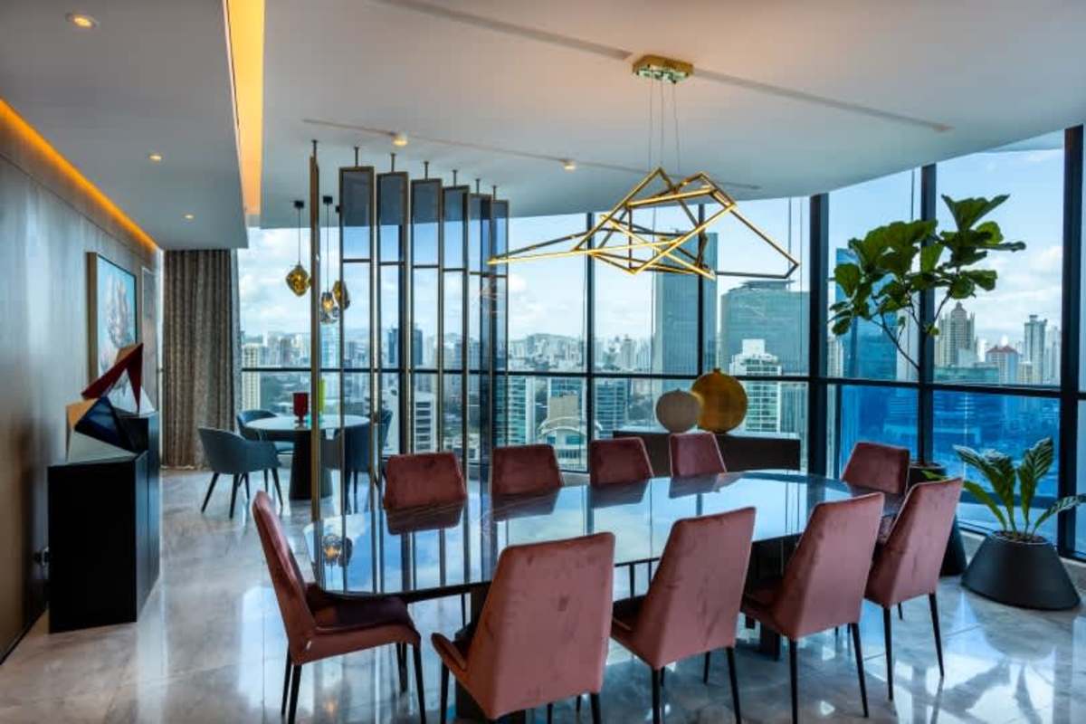 Elegant penthouse dining area with panoramic city skyline Punta Paitilla