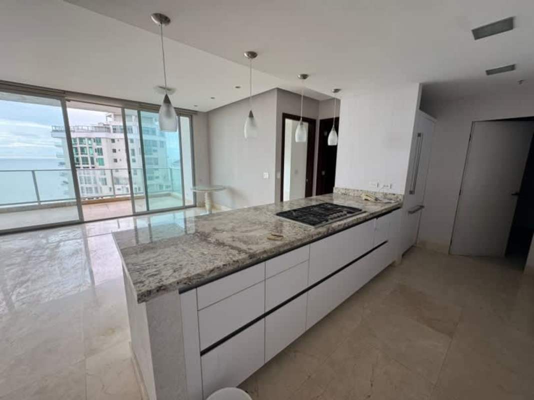 Spacious living area with marble floors floor-to-ceiling windows ocean view PH Ocean Club Panama
