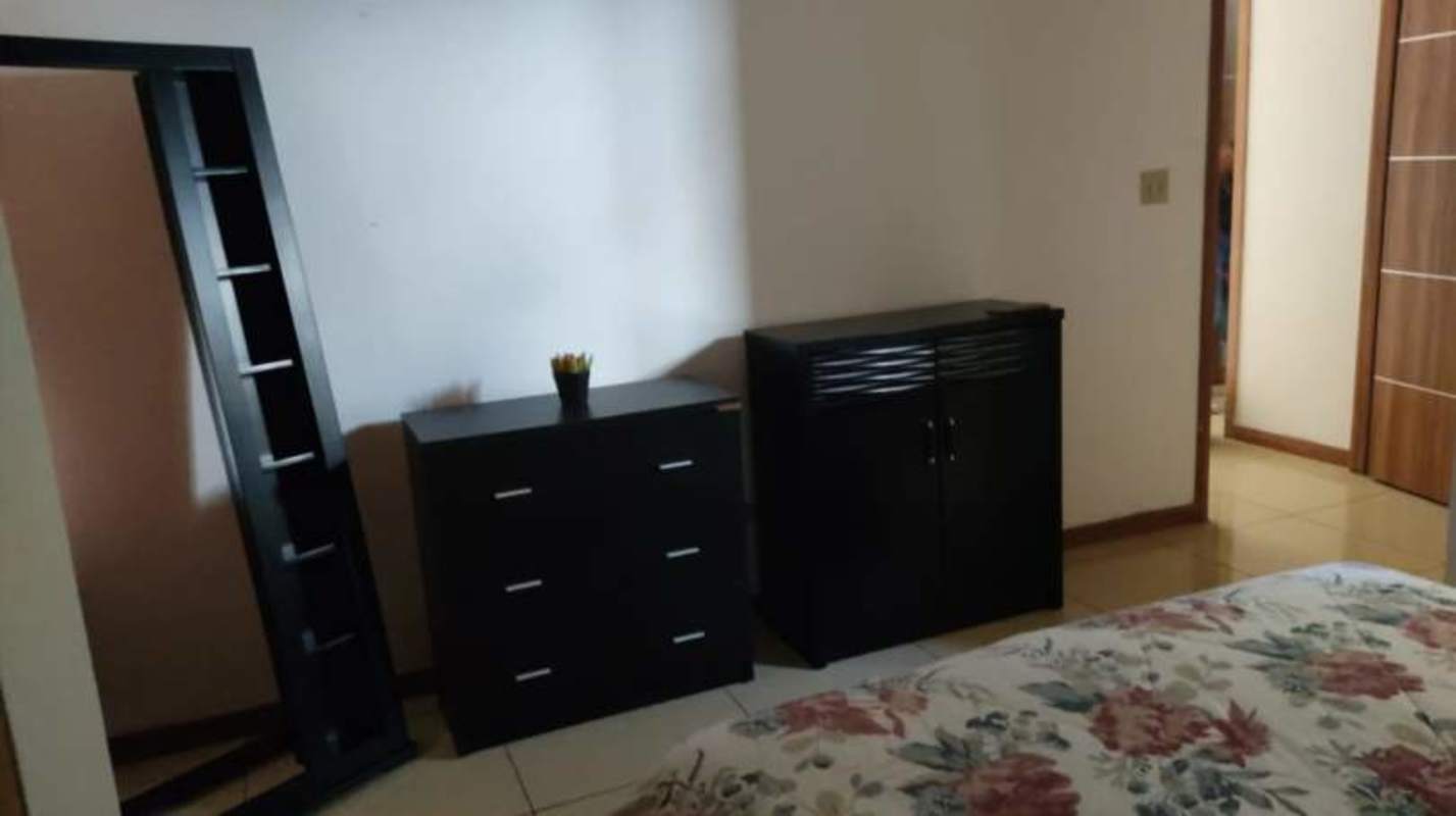 Bedroom with double bed, closet and tile flooring in PH Mahogany Tower Condado del Rey Panama