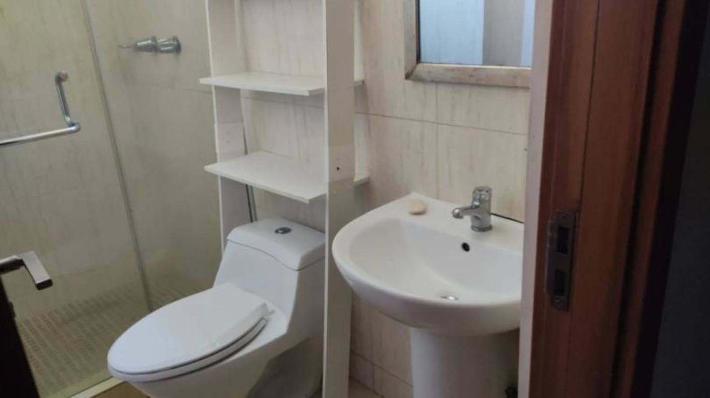 Bathroom with glass shower and modern sink at PH Mahogany Tower Condado del Rey Panama