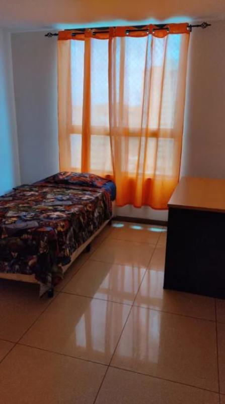 Furnished bedroom with window, natural light and closet at PH Mahogany Tower Condado del Rey Panama