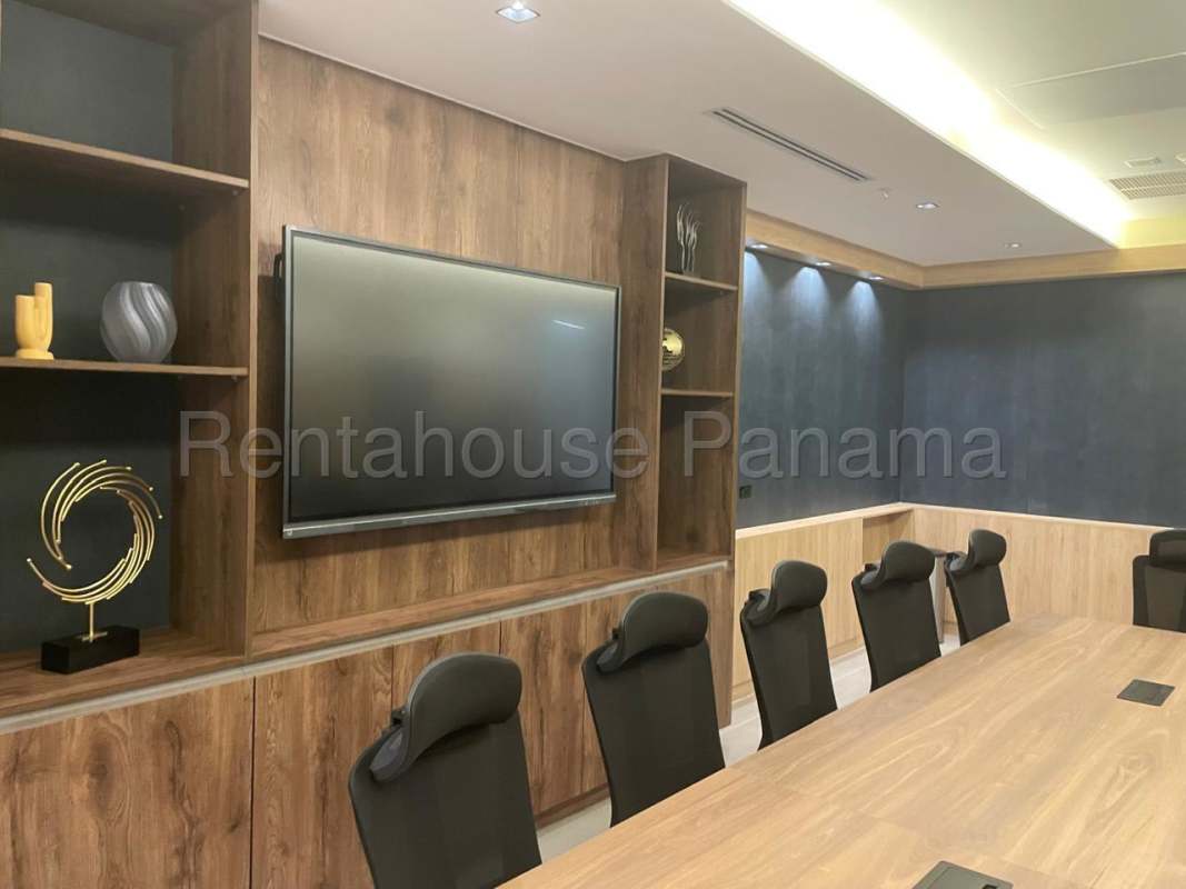 Modern bathroom with floating vanity and neutral tiles inside consultorio at Town Center Costa del Este
