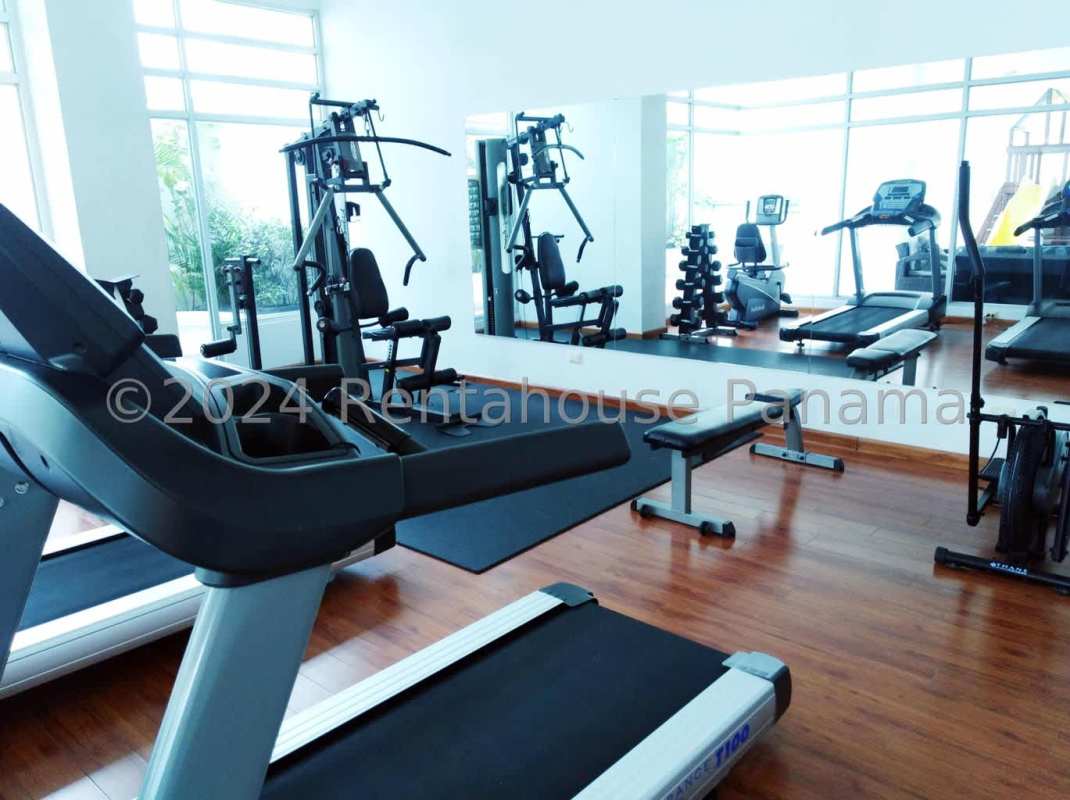 Outdoor pool area with jacuzzi and lounge chairs in PH Costa View Costa del Este Panama