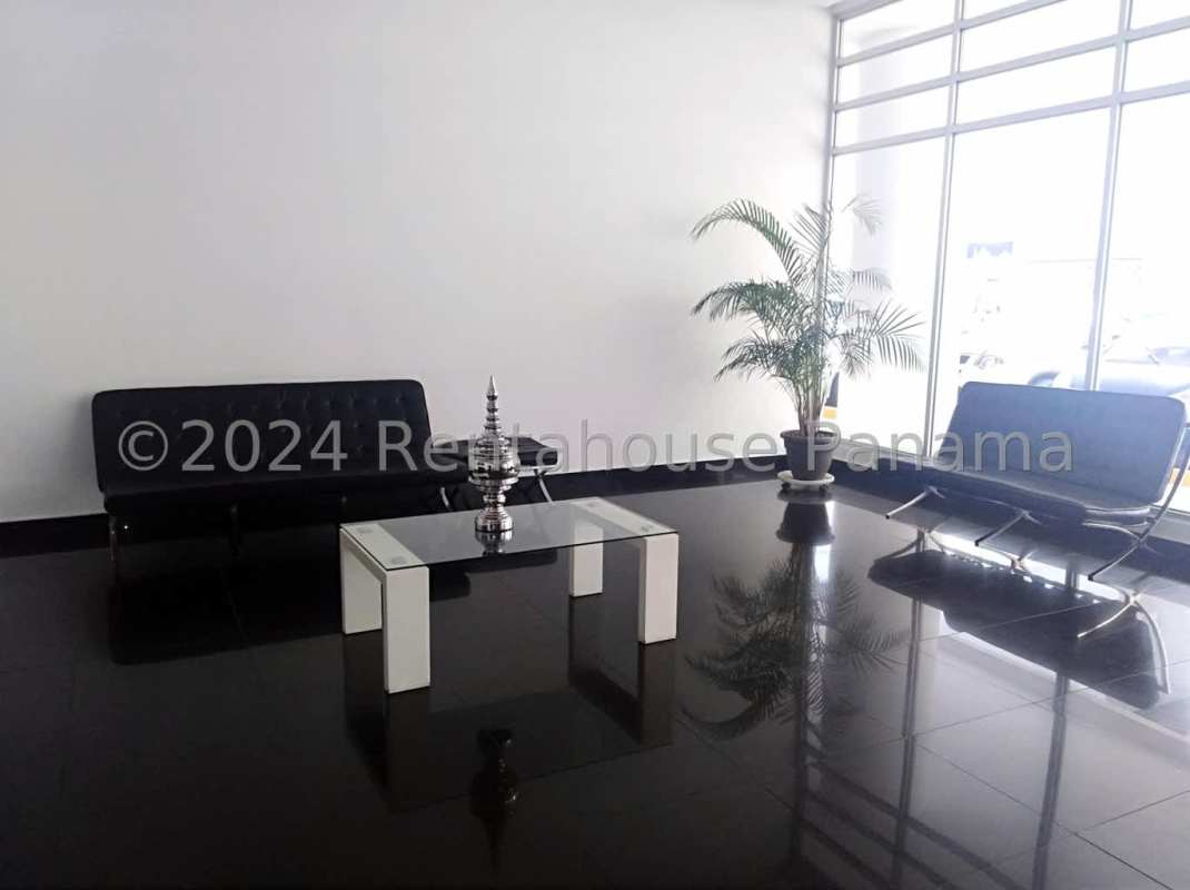 Closed kitchen with granite countertops, tile floors, ample cabinetry PH Costa View Costa del Este Panama