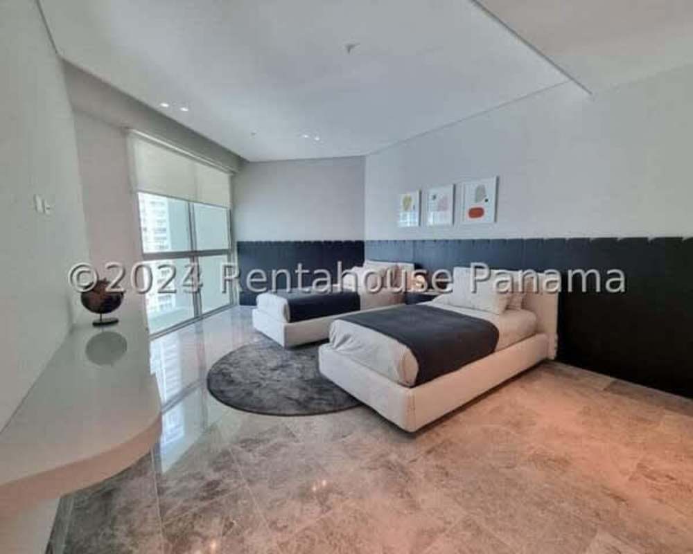 Spacious master bedroom with large windows and ocean view Pacific Point Panama