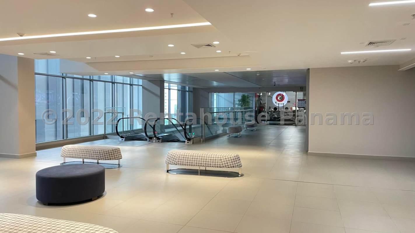 Lobby area with escalators, large windows in Ocean Business Plaza Costa del Este Panama