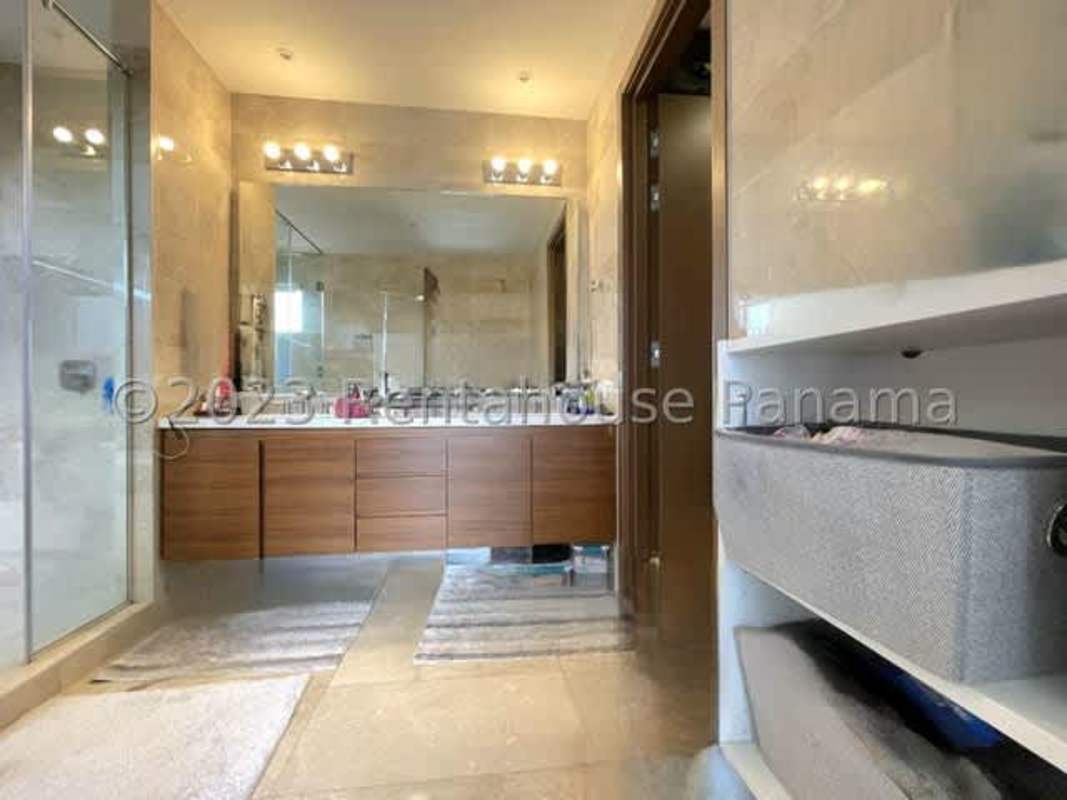 Elegant master suite with panoramic golf views, large windows in PH Albatros Panama