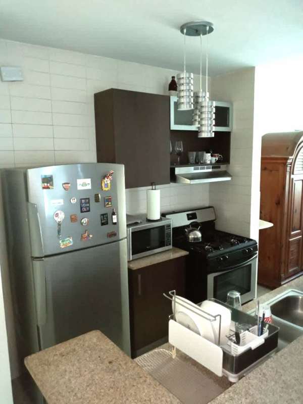 Bathroom with walk-in shower and granite vanity PH Pacific Sky Punta Paitilla Panama