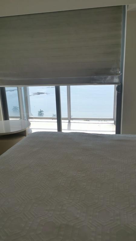 Luxury bathroom with bathtub and glass shower at PH BICSA Panama City