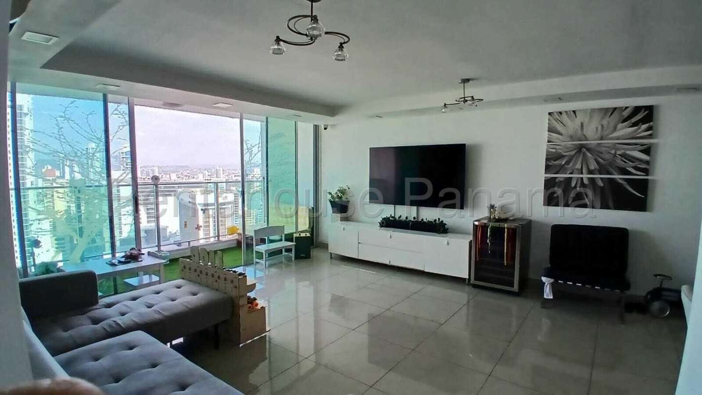 Fully equipped modern kitchen with granite countertops and tile backsplash in apartment for rent PH Serenade Tower Panama