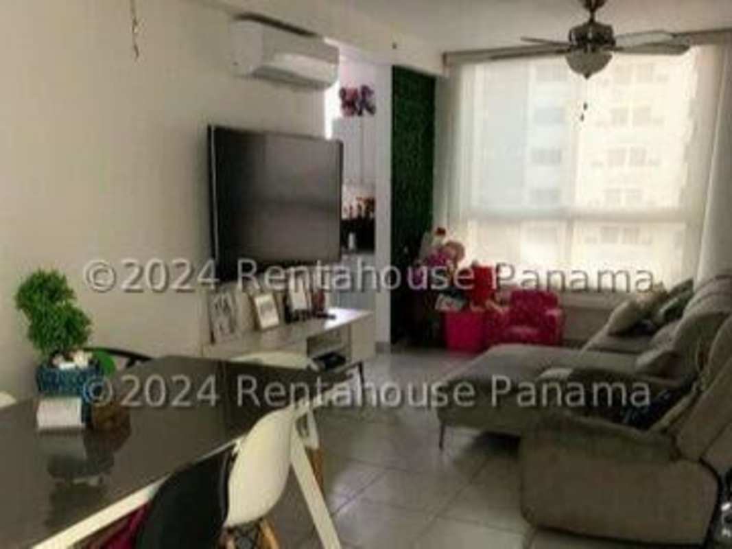 Contemporary kitchen with granite counters at PH Lefevre Park apartment Panama