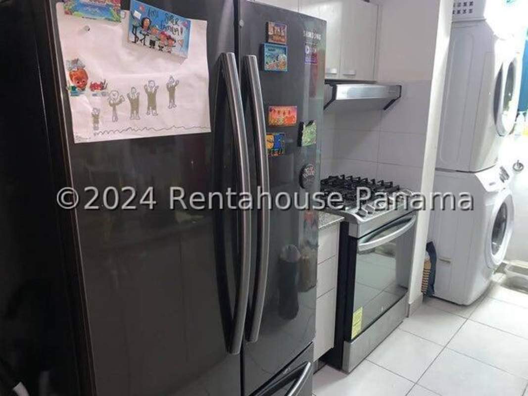 Modern gym with cardio and weight equipment at PH Lefevre Park Panama