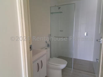 Contemporary bathroom with glass shower and porcelain tiles in Punta Chame condominium