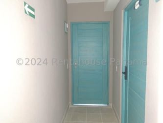 Bright master bedroom with ocean view window in beachfront Ventanas del Mar condo Panama