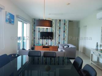 Multiple beachfront swimming pools surrounded by palm gardens in Bijao Resort Panama