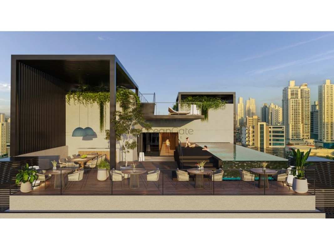 Rooftop dining and leisure area with skyline view PH Be Living Panama