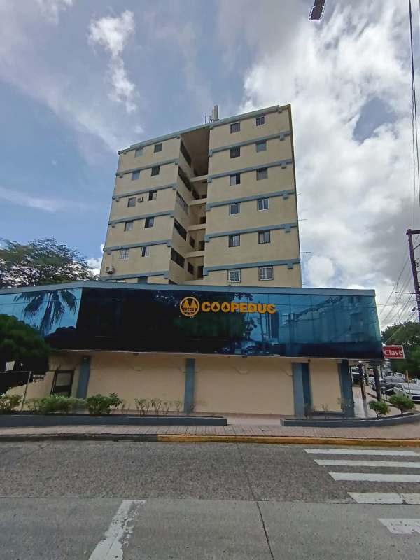 Front facade of PH El Educador with glass storefront COOPEDUC Betania Panama
