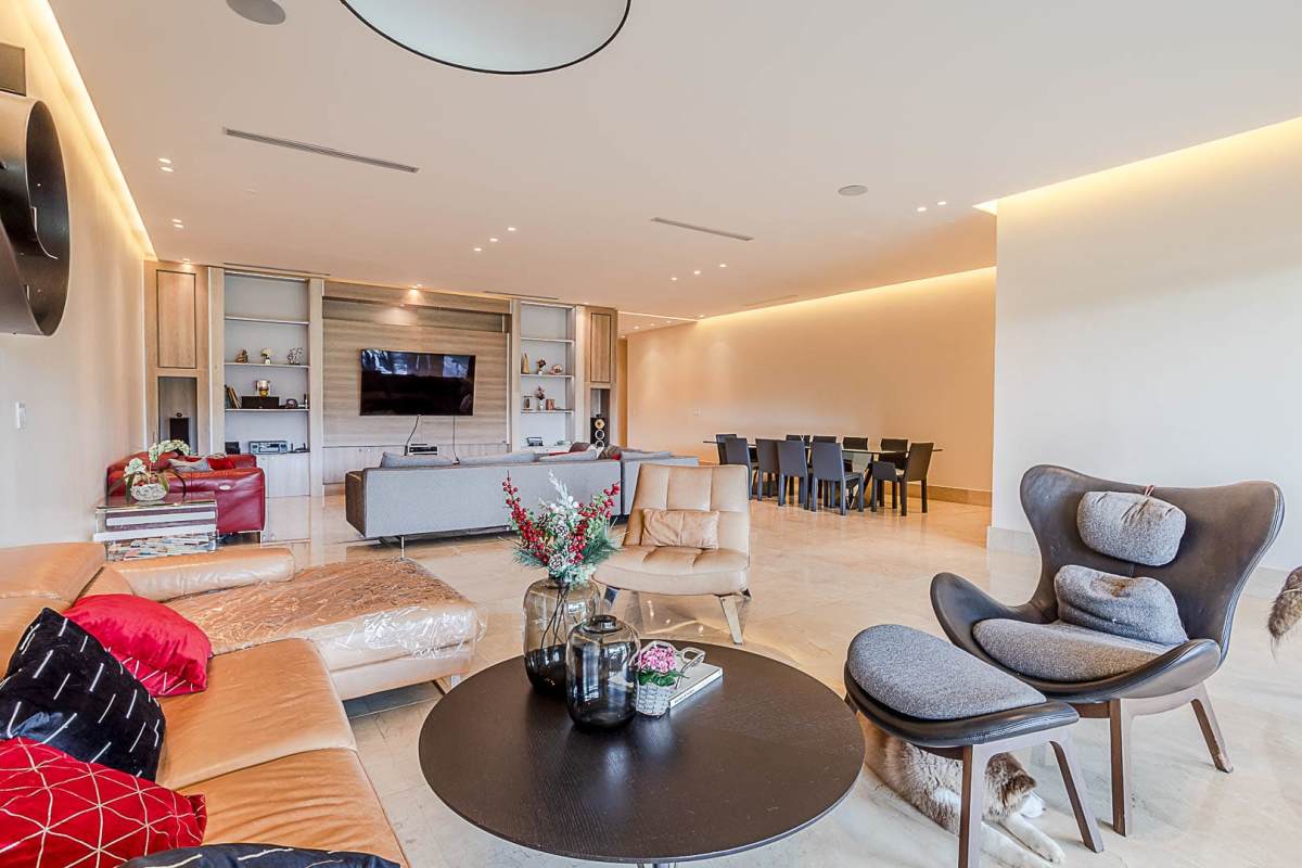 Spacious kitchen island, black granite countertops, built-in appliances The Reserve Santa María Panama