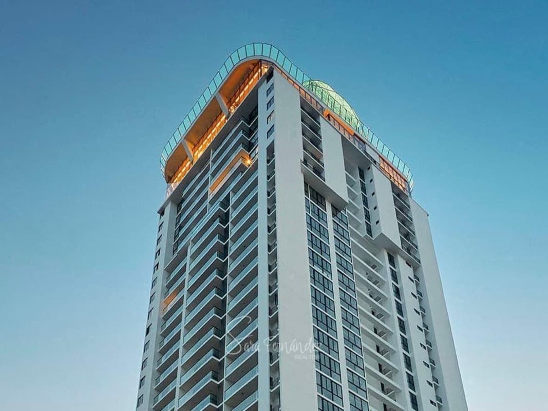 Rooftop infinity pool with city skyline and ocean views in Victory Wellness Coco del Mar Panama