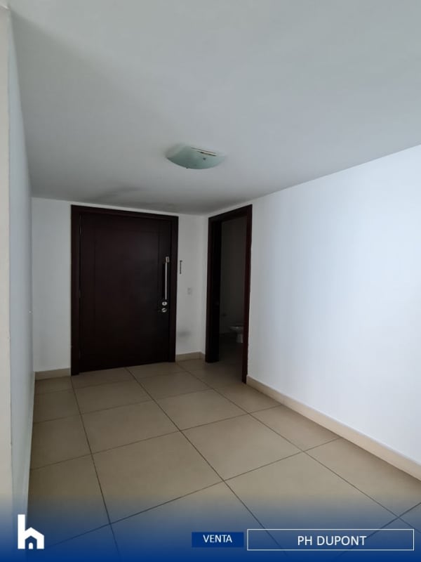 Contemporary kitchen with granite countertops and stainless appliances in PH Dupont luxury condo