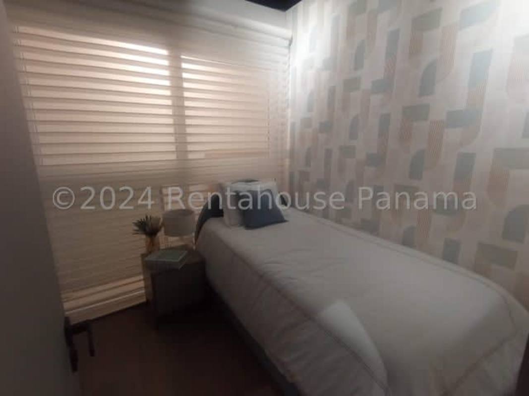 Bright bedroom with window and ceramic flooring in Casa Oasis residential project, Panama City